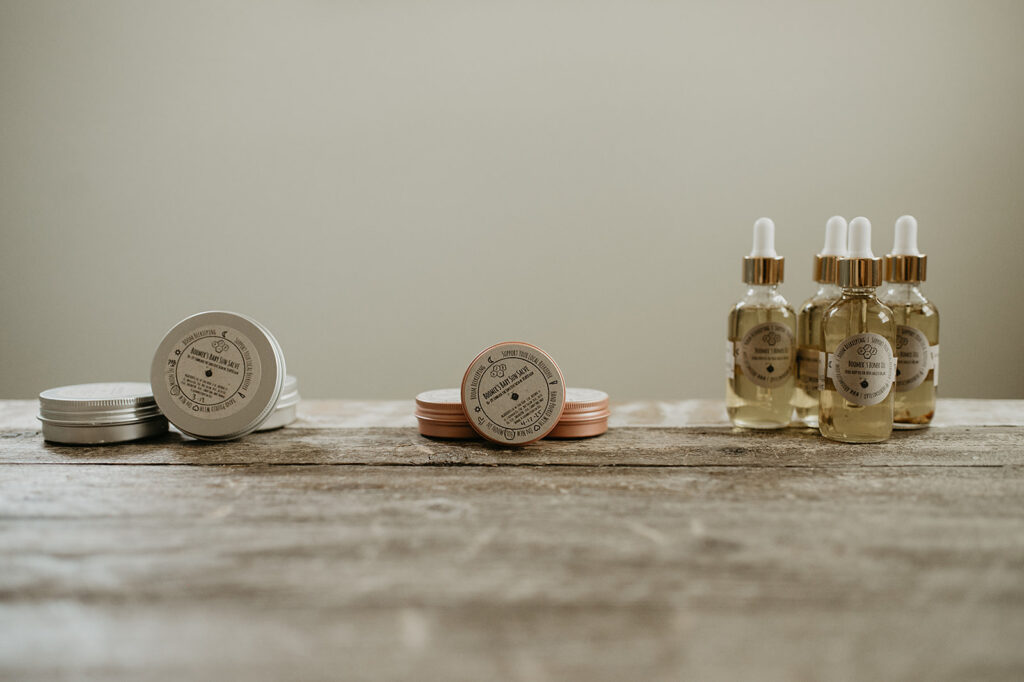 Boomer’s Apothecary natural healing salves and herbal skincare with CBD, beeswax, calendula, and comfrey for holistic wellness and skin repair